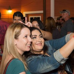 Friends taking a selfy at our bar and grill - The 4 Way Bar and Grill