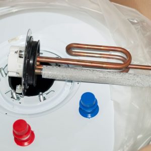 A water tank with its anode rod exposed.
