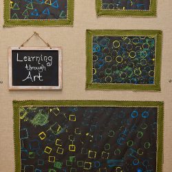 Various pieces of artwork done by children at Strong Start