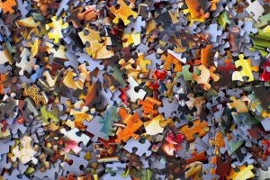 You'll Have Free Time for Hobbies Like Doing a Puzzle Phoneix rental property owner doing puzzle