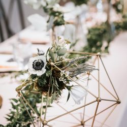 Geometric centerpieces by Bliss Wedding Florist.