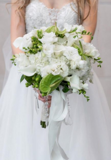 Beautiful Wedding Dress and Bouquet From Blue Bridal Boutique in Denver