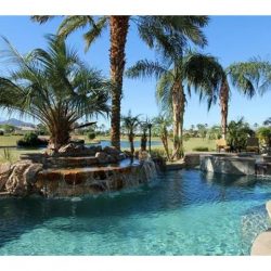 Waterfall pool with hardscape.