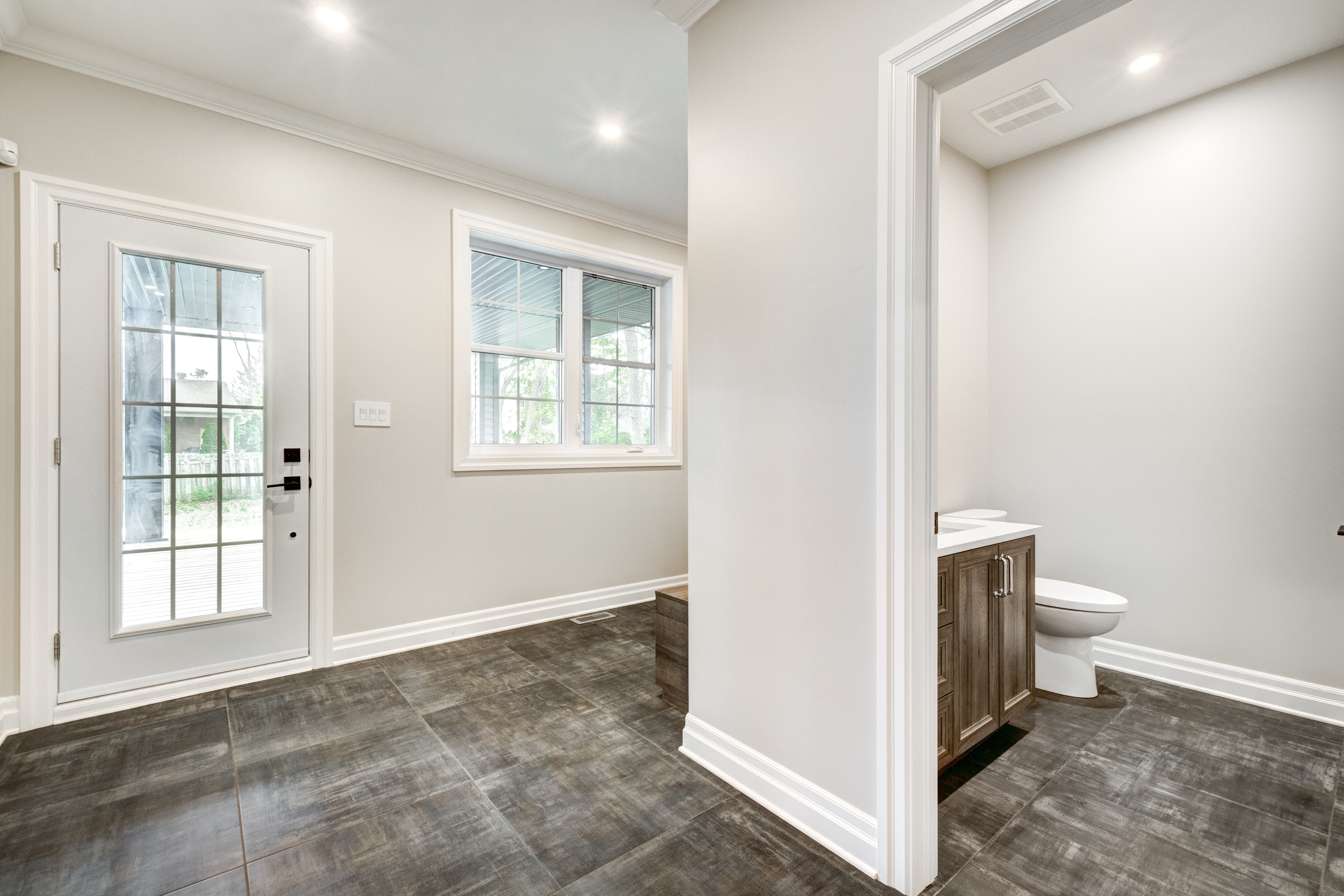 bathroom and back door of a house painted very nicely