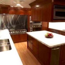Image of spacious, wooden, luxury kitchen created by Dennis Boatworks.