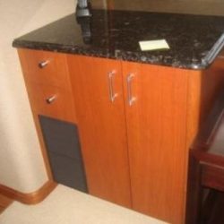 Image of custom crafted cabinet with counter top by Dennis Boatworks.