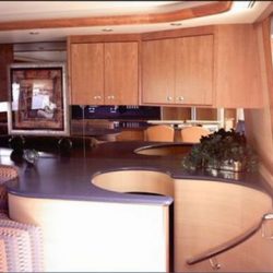 Image of custom staircase and living room interior designed by Dennis Boatworks.