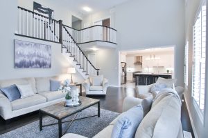 living room staircase in white tones