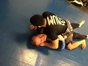 Jacob learning from IMA Instructor Luis Rodriguez