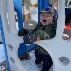 Playing in the cold at our Rosemount toddler care center
