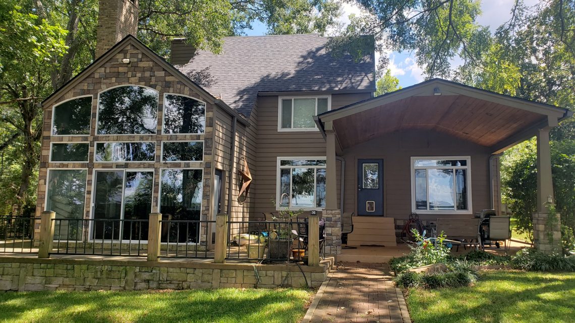 Roof that needs gutter and roof cleaning