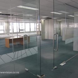 Glass walls separate offices in a stylish manner