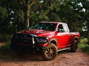 Upgraded pickup truck on a dirt road