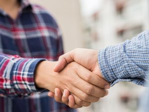 Two people shaking hands