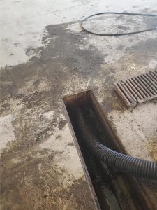 floor drain with a tube sticking out