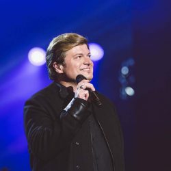 Singer Rob Evan on stage with the classic rock and opera concert Rocktopia.