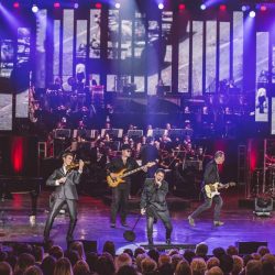 The talented singers and musicians of Rocktopia performing their mix of opera, classical, and classic rock and roll.