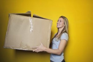 3 Essential Moving Tips for Seniors - Woman with Moving Box