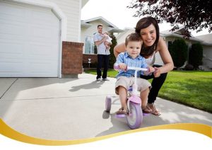 Family In Driveway_shutterstock_90228532_web_swoosh