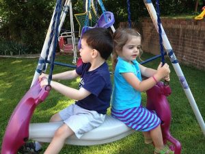 children on a swing
