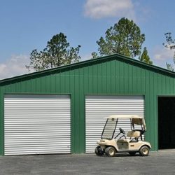 Enclosed Metal Garage with Three Rolling Garage Doors