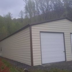 Enclosed Metal Garage with Double Rolling Garage Door