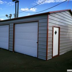 Enclosed Metal Garage with Double Rolling Garage Doors and Walk-Thru Door