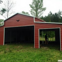 Metal Horse Barn With Gabled Ends and Framed Doorways