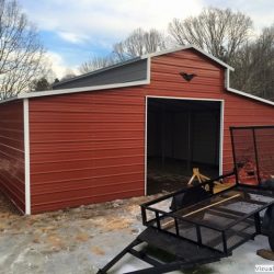 Metal Horse Barn With Gabled Ends and Framed Doorway