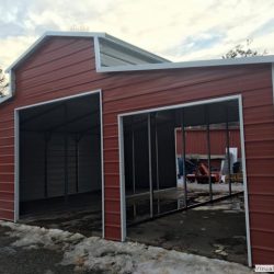 Metal Horse Barn With Gabled Ends and Framed Doorways