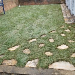 Rock Installs in grass