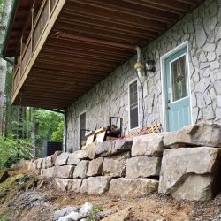 Rock Retaining Wall in back of Asheville Lawn